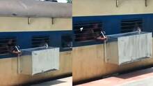 huge-metal-box-outside-moving-train-viral-video