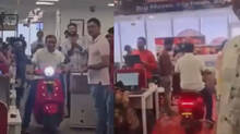 rides-scooty-inside-office-surprises-employees