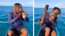 ctopus-latches-fisherman-face-philippines